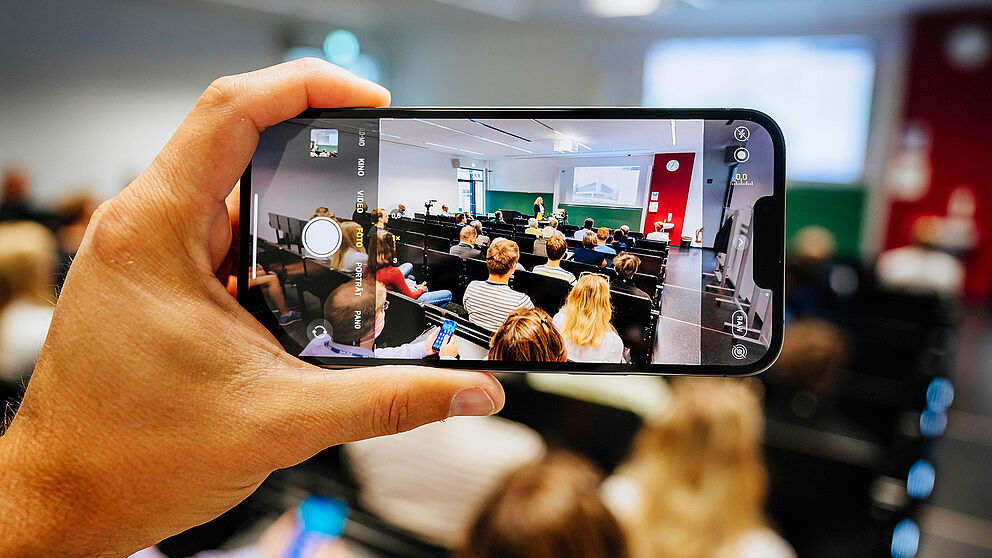 A smartphone recording a teaching situation.