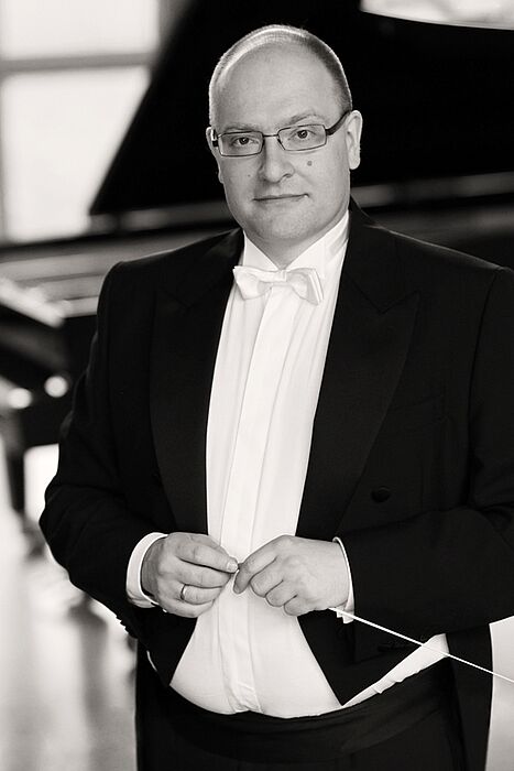 Foto: Steffen Schiel, Chefcoach des  Hochschulorchesters