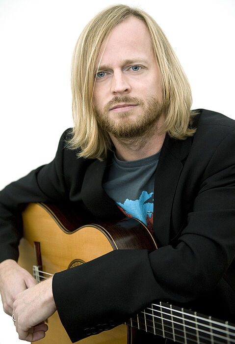 Foto: Solist bei den Konzerten des Hochschulorchesters: Thorsten Drücker (Gitarre)